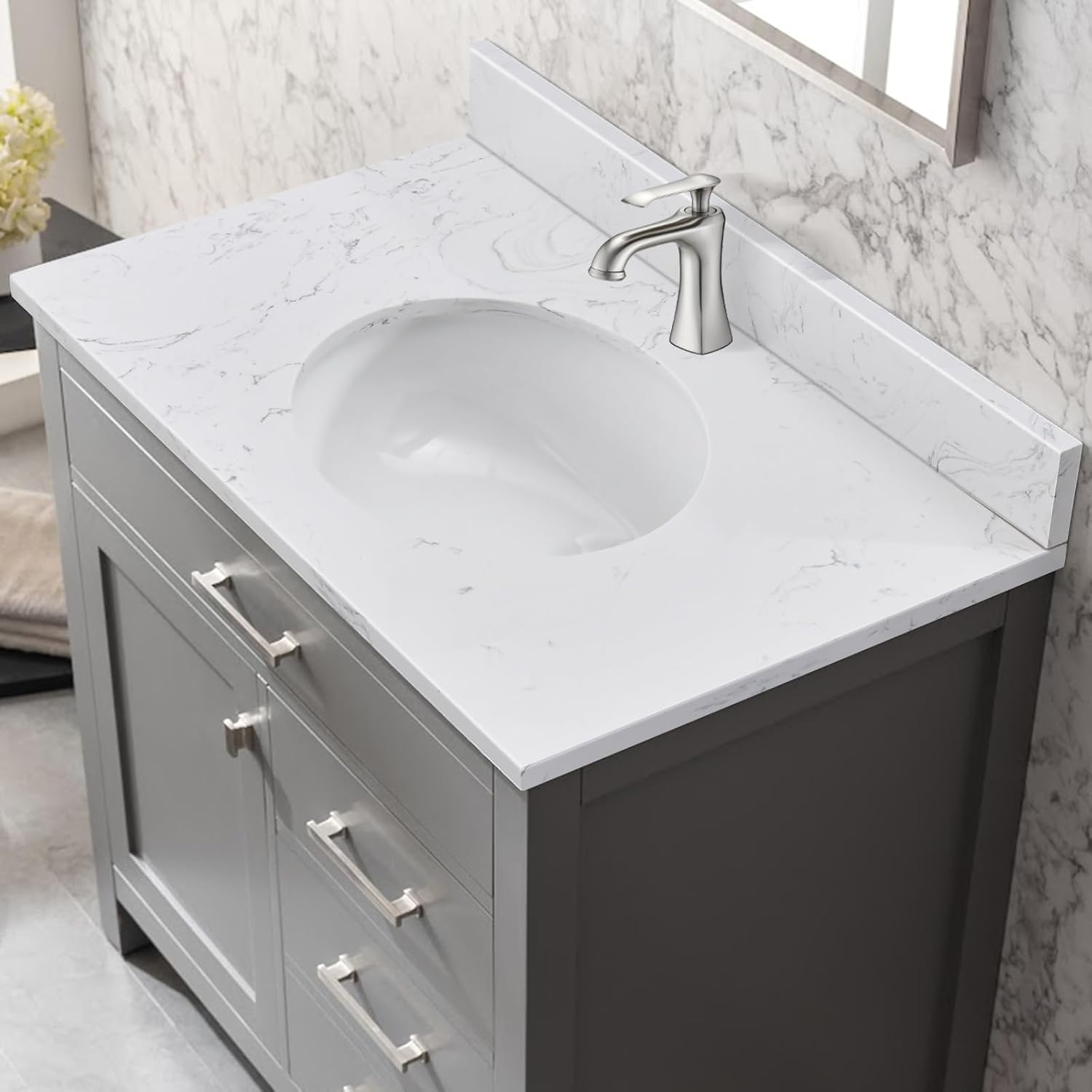 Engineered stone vanity top with round sink